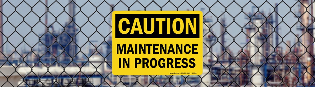 maintenance sign on fence oil refinery turnaround banner